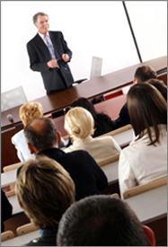 Photo of Instructor speaking to class.